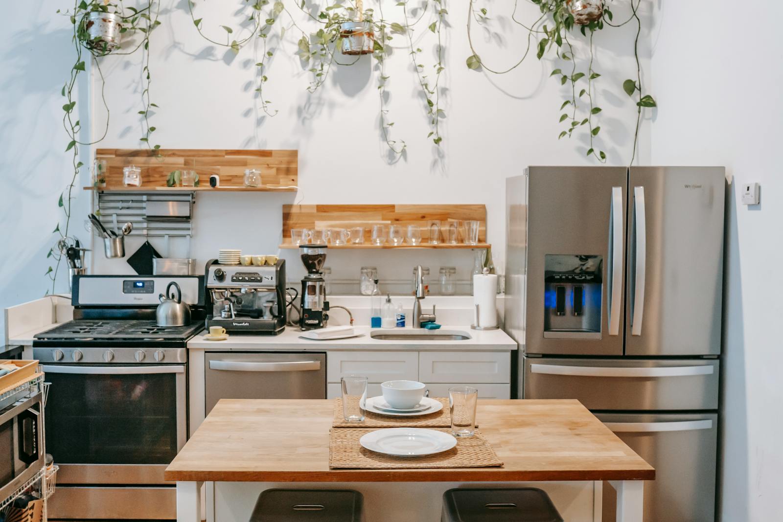 Japandi style kitchen with minimalist wood cabinetry, clean lines, and natural light.