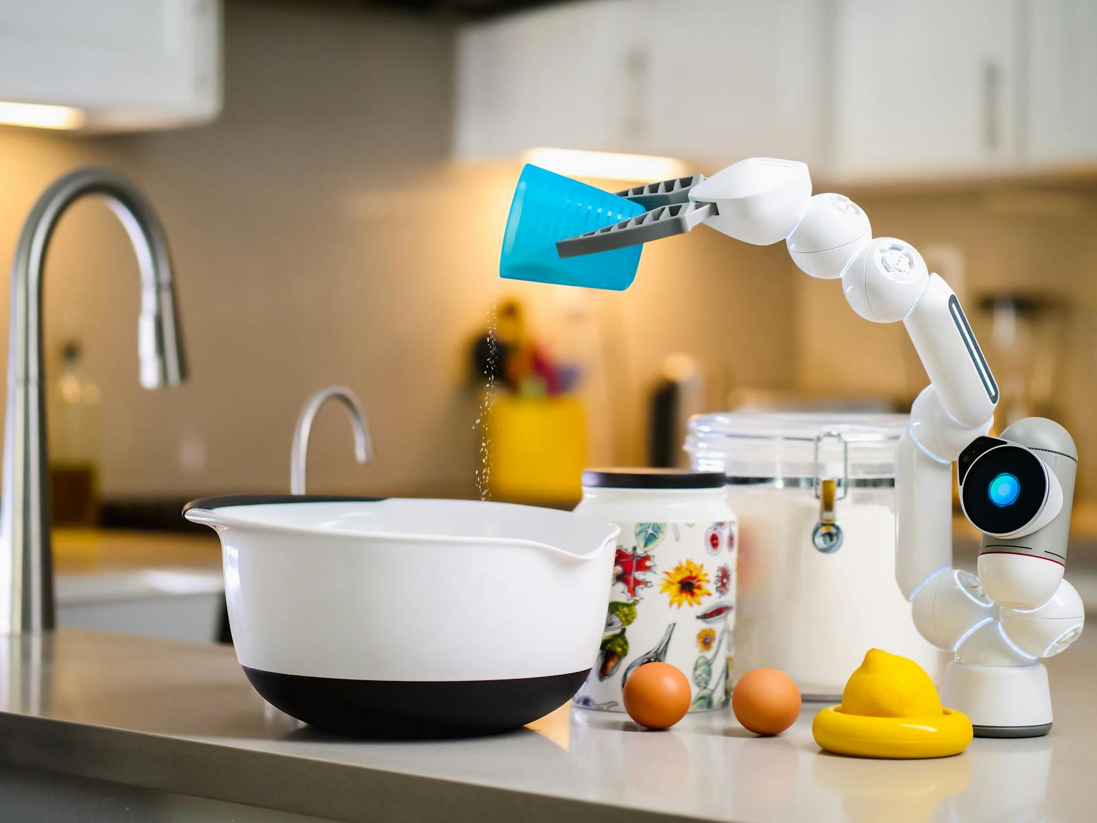 A futuristic robot in a modern kitchen holding a cup, representing the rise of smarter kitchen technology.